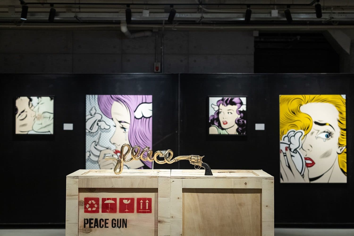 D*Face pop works with the “Peace Gun” sculpture on its crate plinth