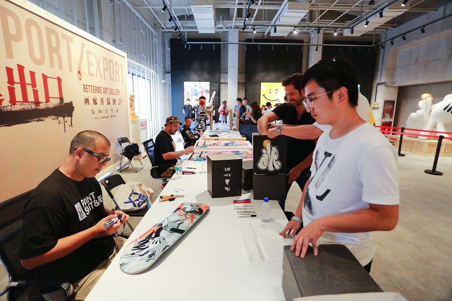 Artist signing session at the Import / Export opening