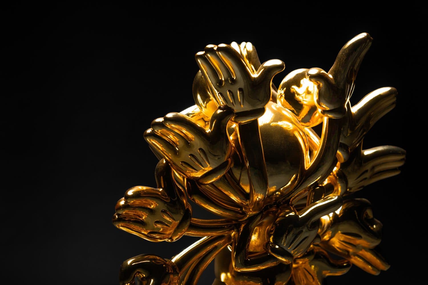 A detail of the gold hands