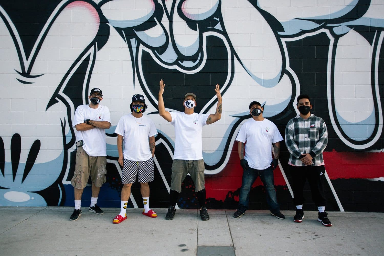 The paint crew at the finished ‘VOTE’ wall.