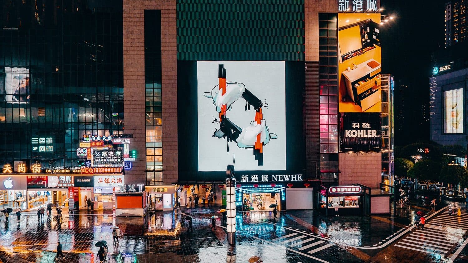 OG Slick artwork on a city-center LED screen.