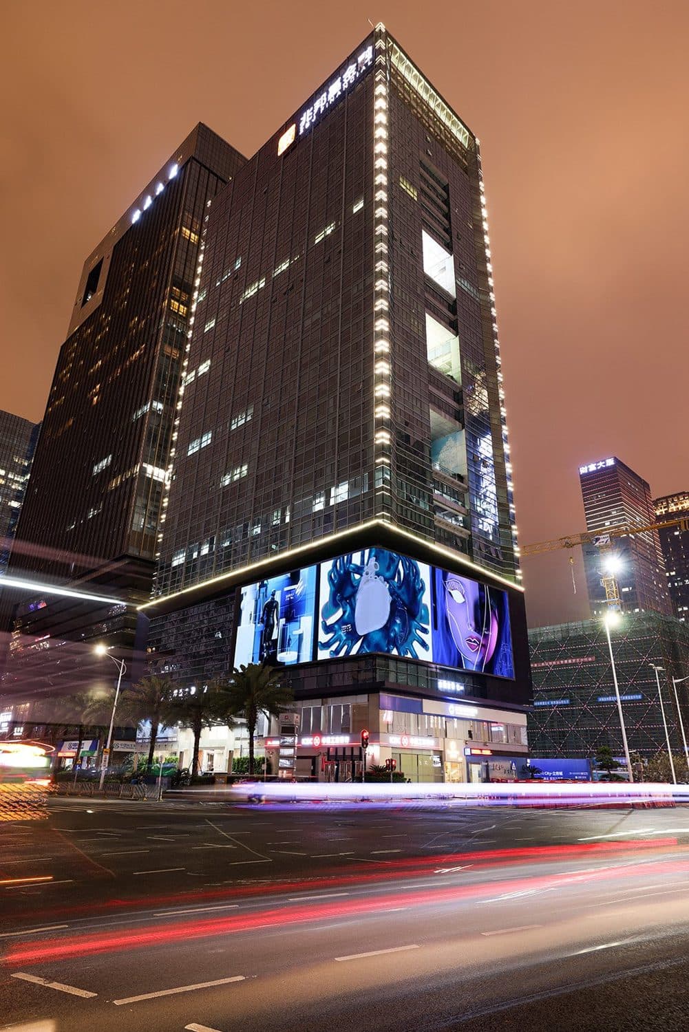 Digital works running across the screens of a Shenzhen tower.