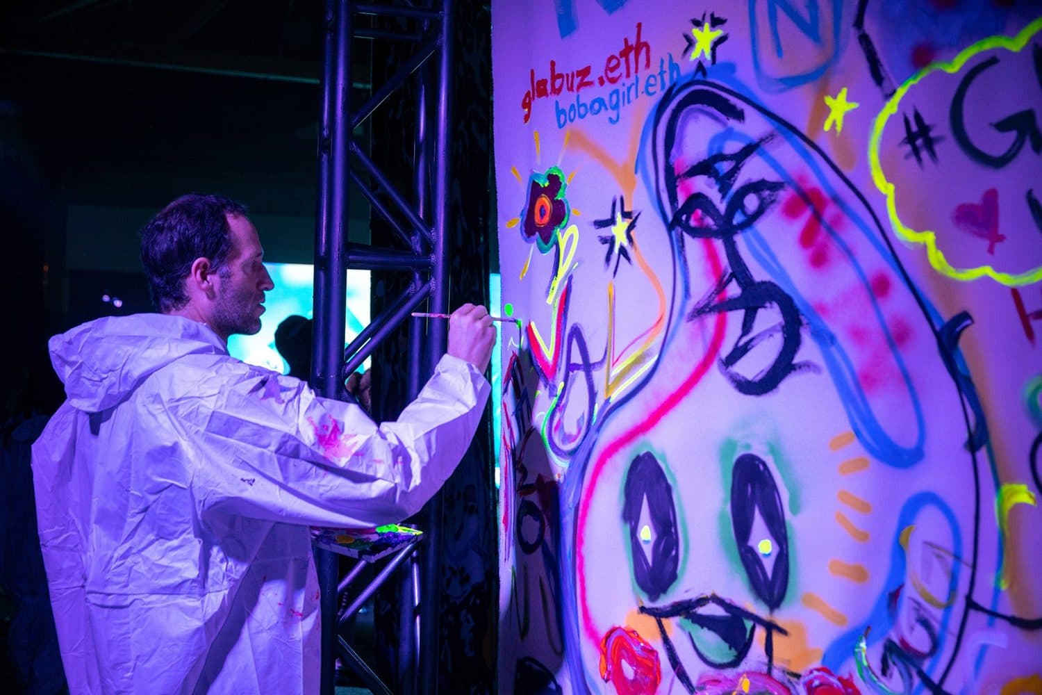 Framed prints and mirrors set out as painting surfaces at NFT LA Week.