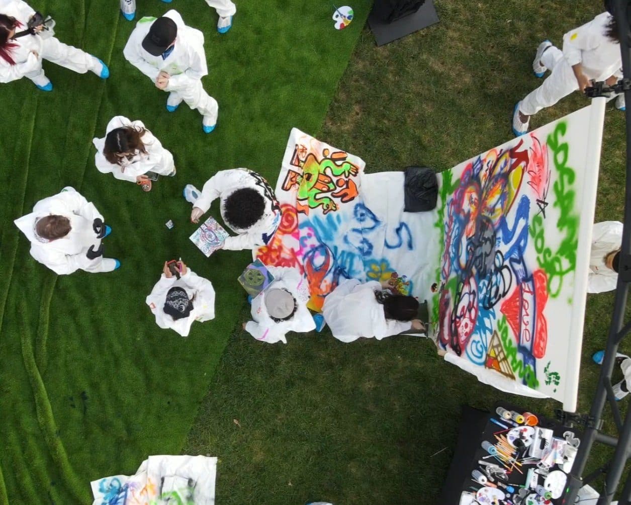 Finished and in-progress canvases at the VeeCon Paint Party.