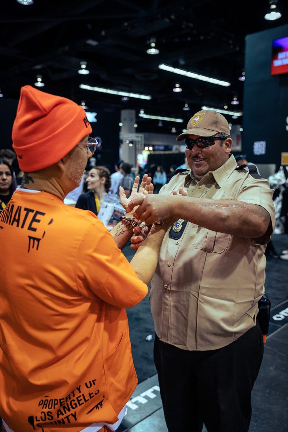 Prison flash tattoos applied to buyers at the pat-down gate.